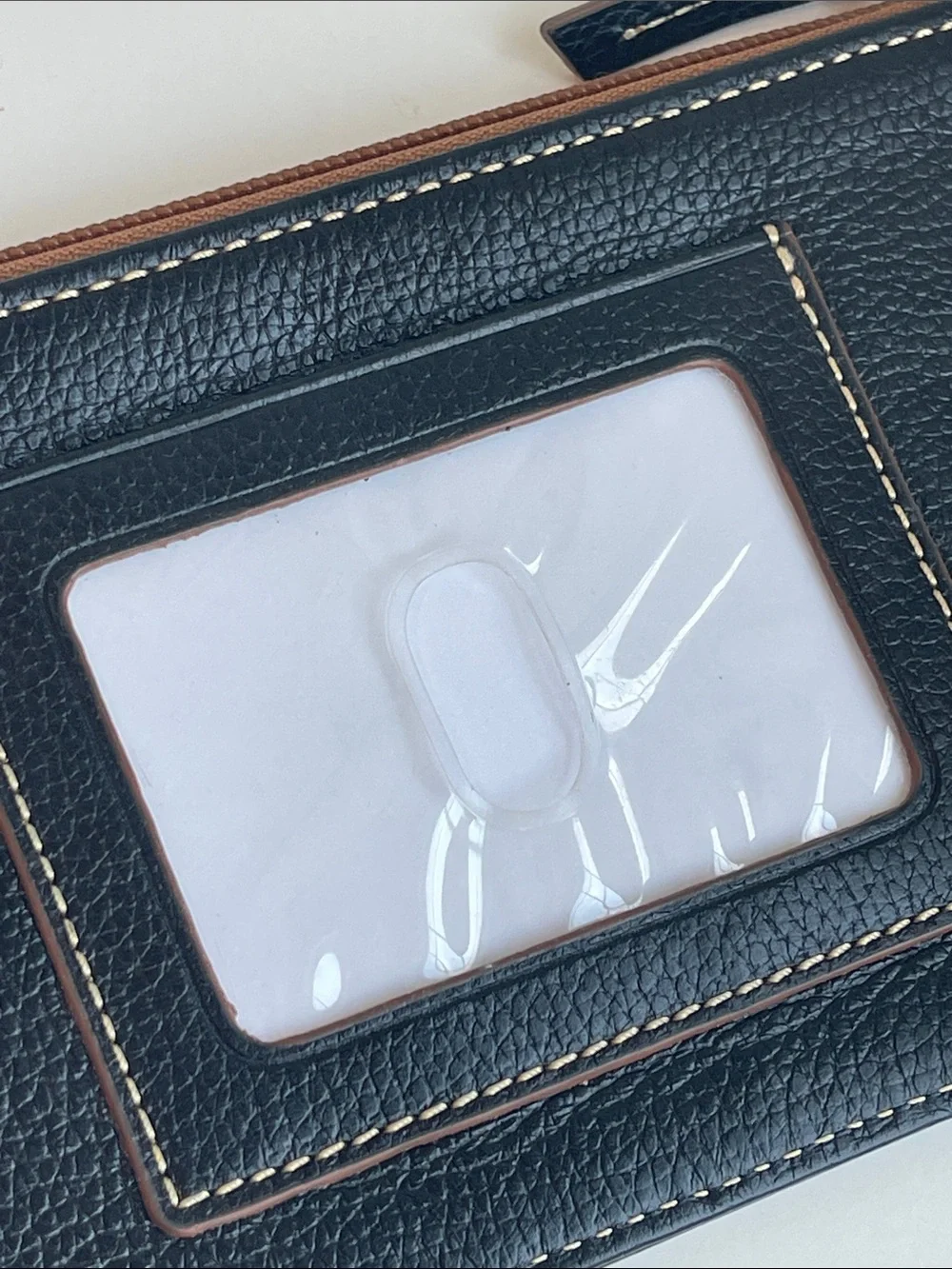 Dooney & Bourke Pebbled leather Slim Clutch